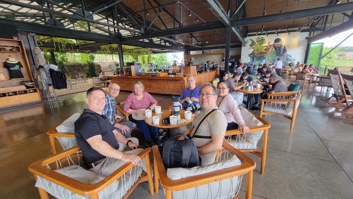Cameras down, coffee up — a quick stop at Hacienda Alsacia on the road from San José to La Fortuna